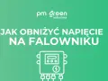 Grafika z napisem "Jak obniżyć napięcie na falowniku" i ikoną urządzenia.