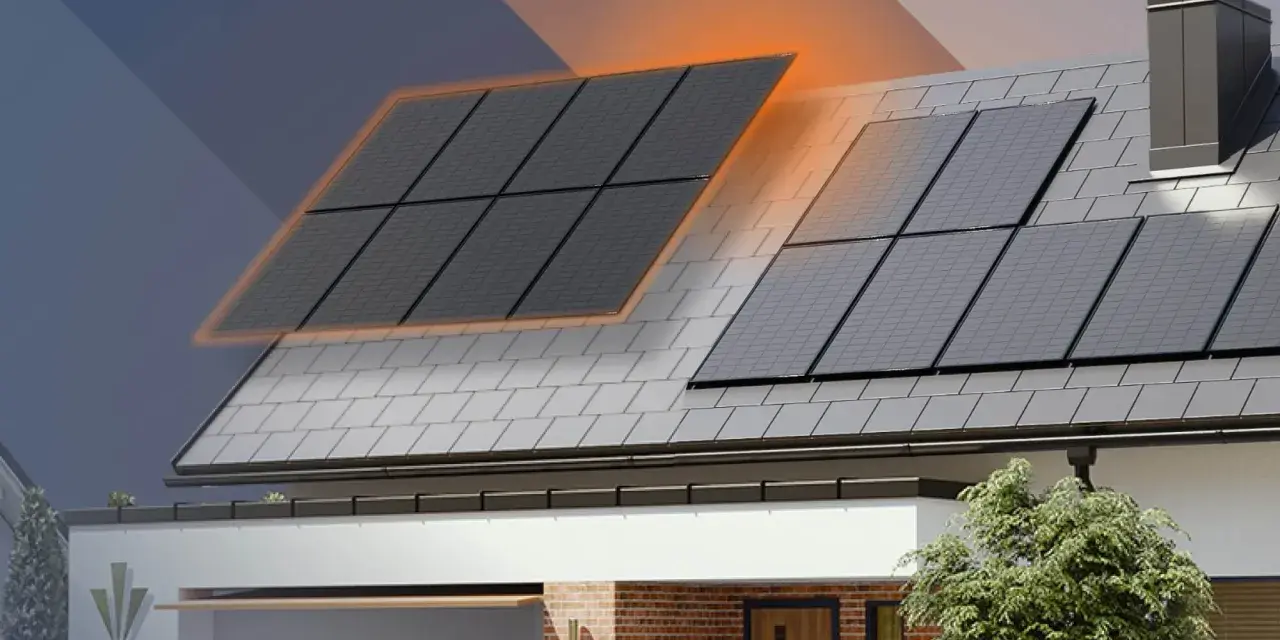 Rozbudowa instalacji fotowoltaicznej z dwoma falownikami na dachu domu. Panele słoneczne generują energię.